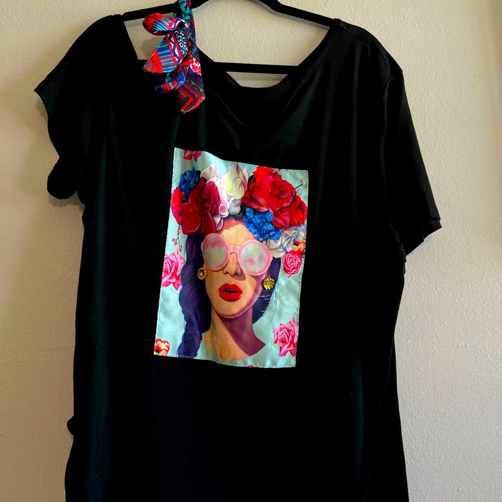 Black casual top, from the boutique to you.